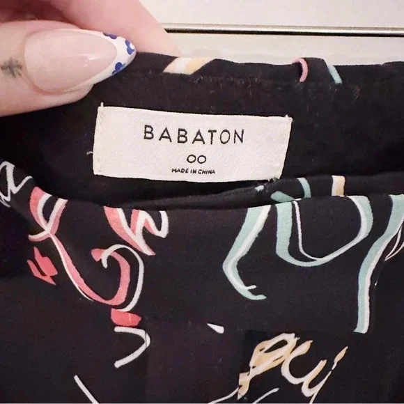 Aritzia Babaton Sadiki Pants Wide Leg Printed Black French Faces - Picture 4 of 7